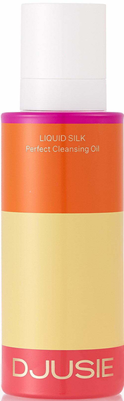 Eine Flasche mit weißem Deckel, rosa, orange und beige Farben, beschriftet DJUSIE Liquid Silk Perfect Cleansing Oil.