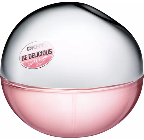 Een compacte, ronde verpakking met glimmend zilveren deksel en roze bodem, gelabeld 'DKNY BE DELICIOUS' en 'vers geur.'