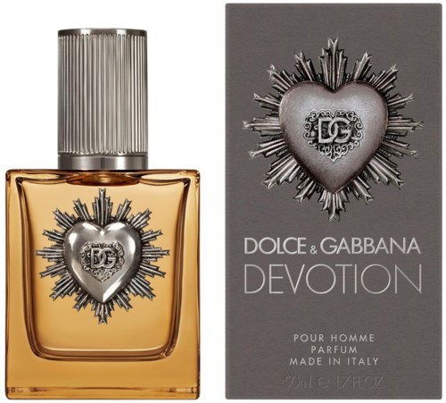 Een parfumfles en doos met een hart en stralend ontwerp, gemarkeerd Dolce & Gabbana Devotion. Elegant en stijlvol.