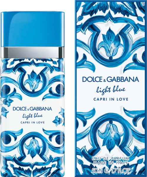 Blauwe en witte bloemige parfumfles met verpakking, gelabeld als Dolce & Gabbana Light Blue Capri in Love.