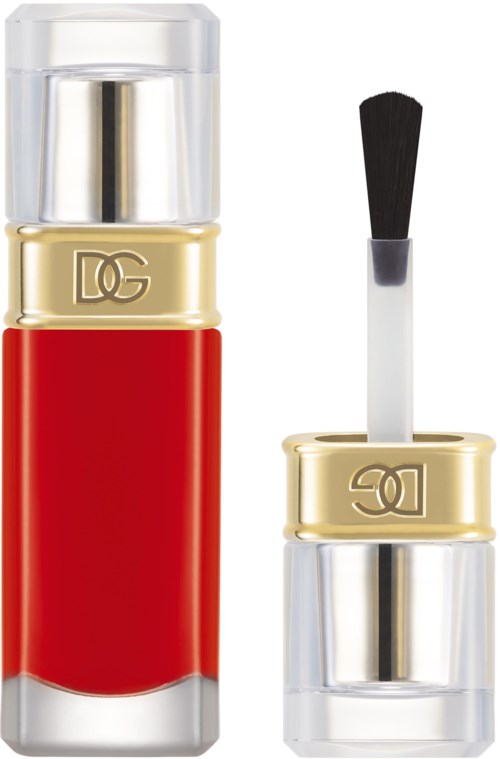 Lip gloss tube with a red body, gold band with 'DG,' and an applicator brush. Clear cap on top.