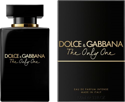 Een zwarte parfumfles met een zwart deksel naast een zwarte doos, beide met goud en wit tekst voor Dolce & Gabbana parfum.