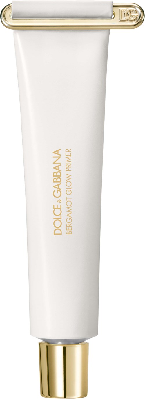 A white tube with gold accents and gold text, likely a cosmetic product from Dolce & Gabbana.