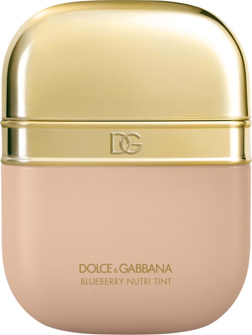 A small, oval-shaped container with a shiny, gold upper part and a light pink lower part. It has the DG logo and labels for Dolce & Gabbana Blueberry Nutri Tint.