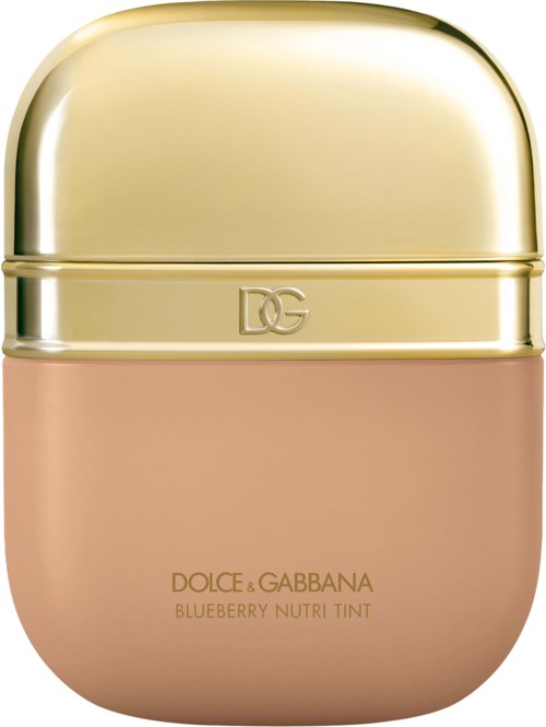 A compact, pink, apple-shaped container with a gold lid and DG logo, labeled Dolce & Gabbana blueberry nutri tint.