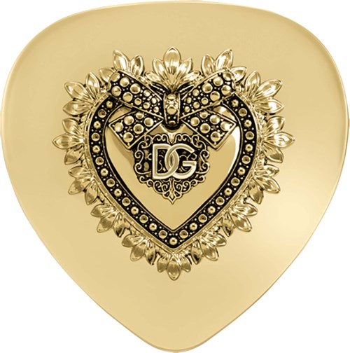 Gold heart-shaped jewelry with a bow and DG logo, surrounded by floral details.