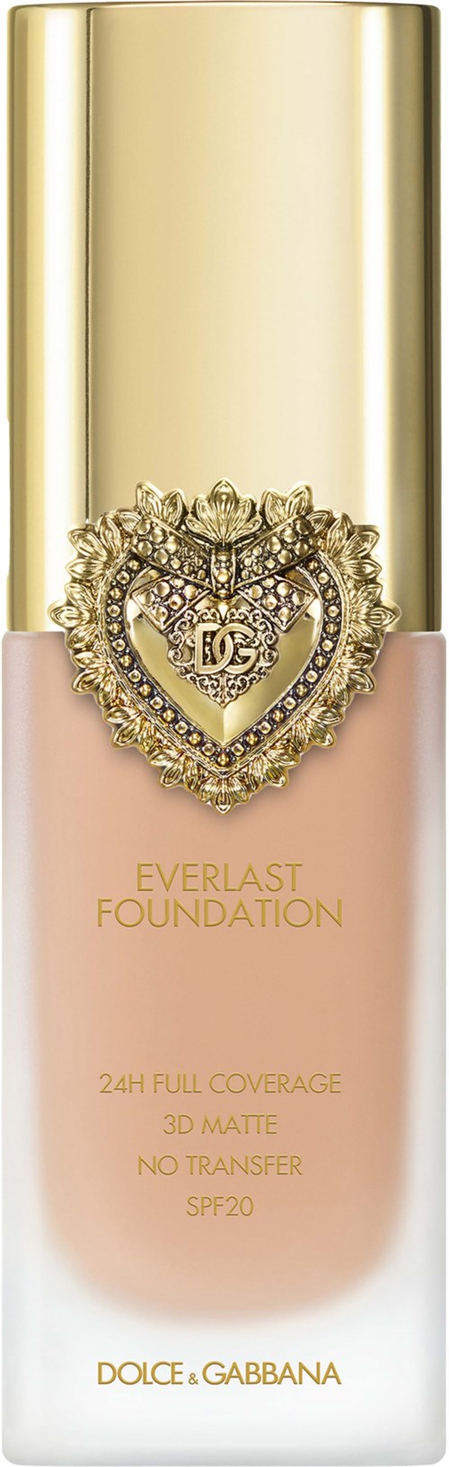 A bottle of Dolce & Gabbana Everlast Foundation with gold cap and a decorative heart-shaped design with crystals.