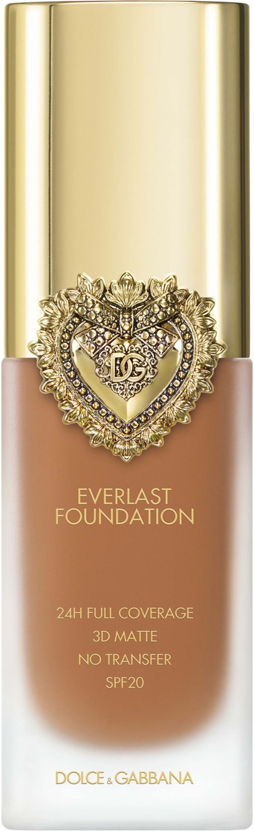 A foundation bottle with a gold cap, a heart logo with gemstones, and text about full coverage and SPF20.