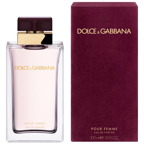 Een parfumfles en doos labeled Dolce & Gabbana, voor vrouwen, met roze vloeistof binnen.