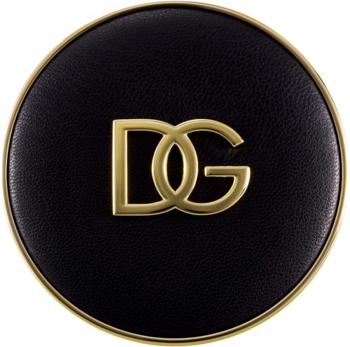 Ein runder schwarzer Logo mit goldenen Buchstaben D und G, umrandet von einem goldenen Rand.