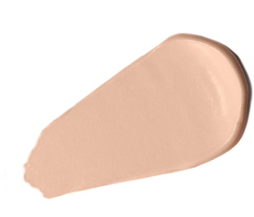 Eine beige Flüssigkeit in Tränenform auf weißem Hintergrund, möglicherweise Foundation oder Gesichtsmakeup.