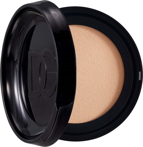 Ein schwarzer Compact mit beigem Puder.