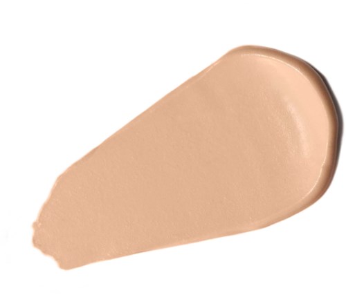 Ein beige flüssige Foundation-Strich mit runder Kante vor weißem Hintergrund.