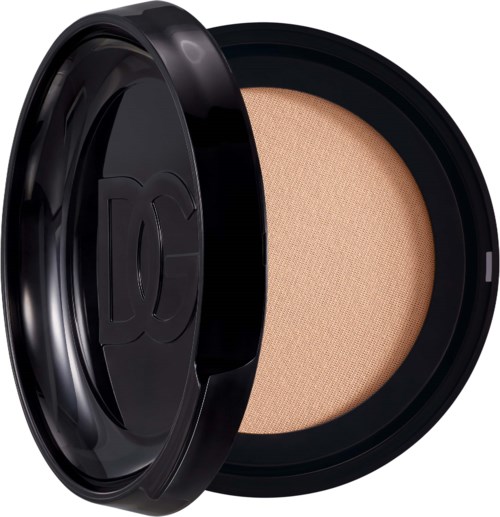 Eine runde Make-up-Compact mit beigem Puder und schwarzem Gehäuse.