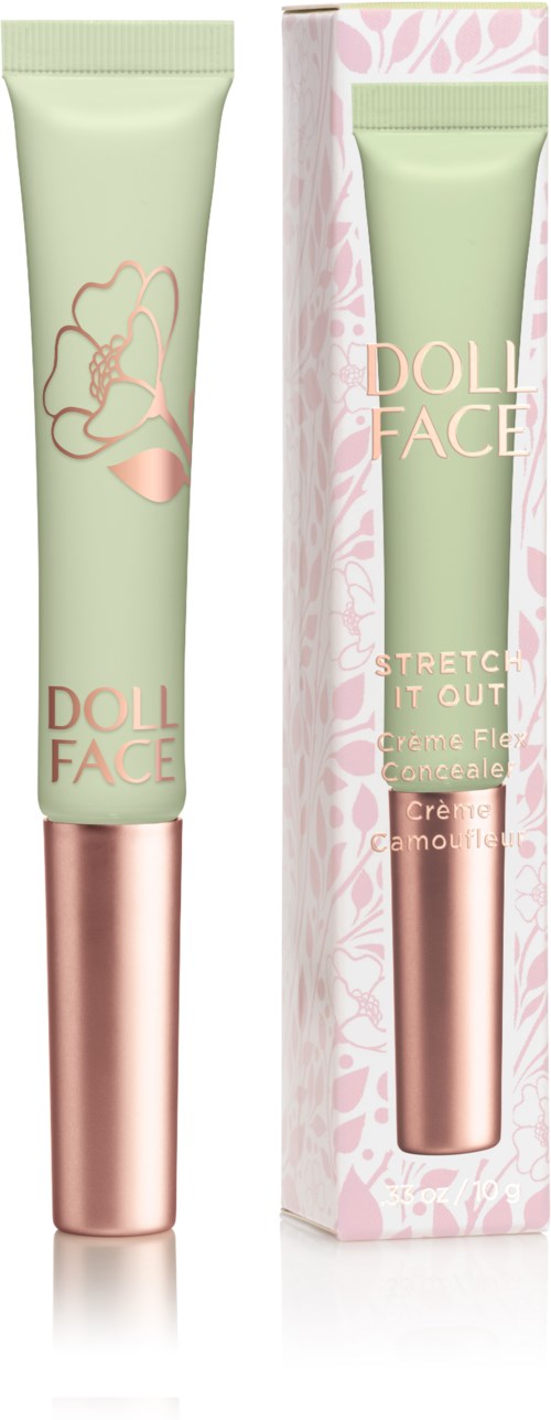 Eine Tube Hautpflegecreme mit pastellgrünem und roségoldenem Design, teilweise in einer rosa Blumenverpackung.