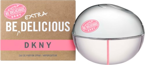 DKNY Be Delicious hajuvesi pyöreässä, hopeisessa astiassa, jossa on pinkki tarra ja vastaava kääre.