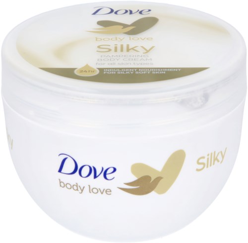 Ein weißer Behälter von Dove mit Körperpflege, gekennzeichnet 'Silky' und 'für alle Hauttypen', mit goldener und blauer Schrift und Logo.