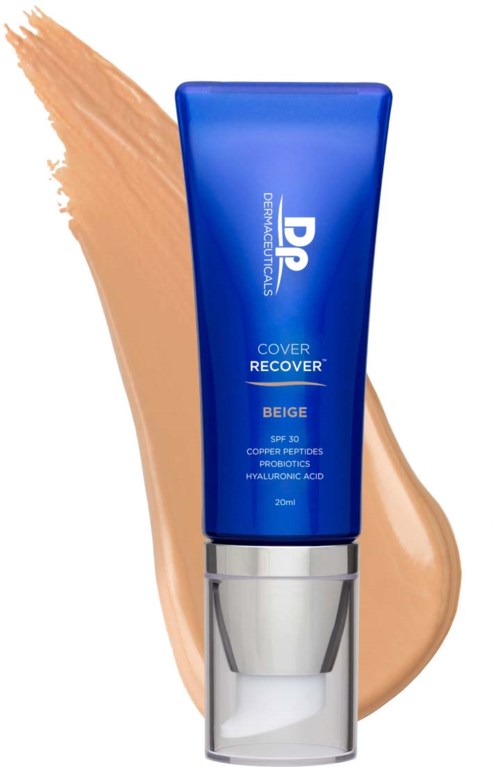 Blue tube of face makeup with beige color swatch background and silver cap.