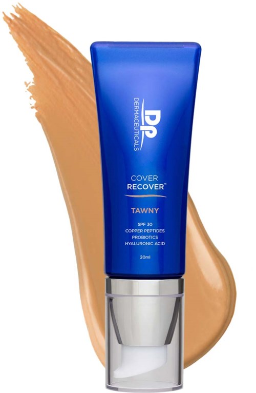 Blue tube of skin cover cream with beige background brush stroke.