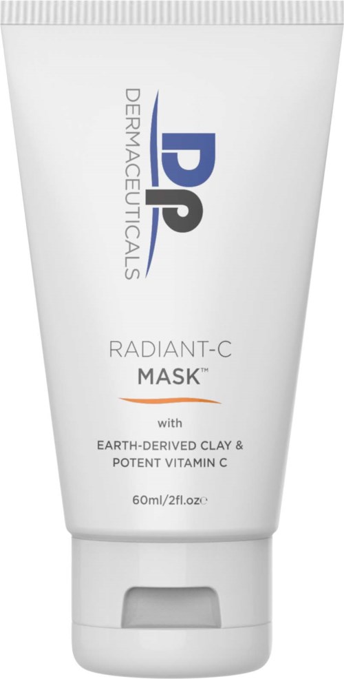 A white tube with blue and black text, labeled as a skin mask with clay and vitamin C ingredients.