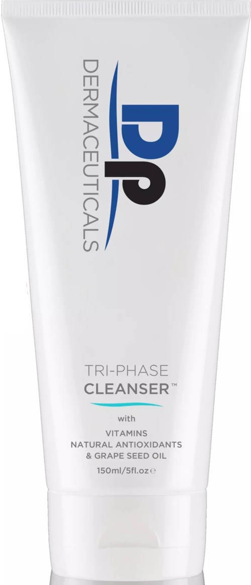A white tube of Dermaceuticals Tri-Phase Cleanser with blue and black text, containing vitamins and antioxidants.