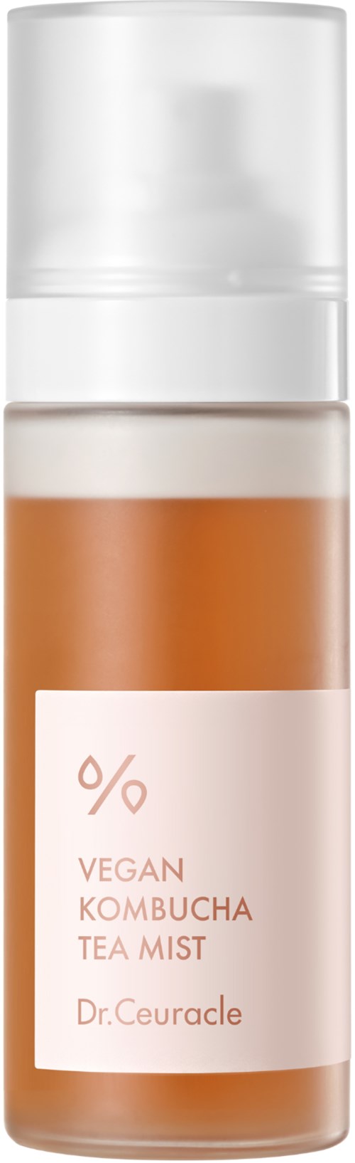 Een klein flesje met pomp, gelabeld als veganistische kombucha-theespray door Dr. Ceuracle.