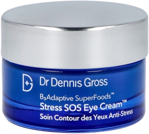 En blå krukke med øyekrem og sølvlokk, merket som Dr. Dennis Gross Stress SOS Eye Cream.