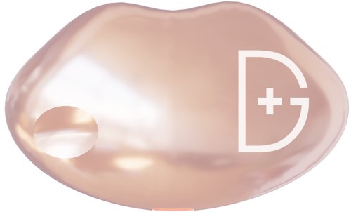 Eine weichrosa Kapsel mit weißem medizinischem Kreuz und Logo, glänzende und glatte Oberfläche.