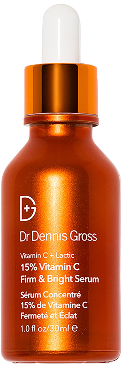 En liten oransje flaske med en hvit dråpetupp merket som Vitamin C og Laktisk serum, fast og lyst.