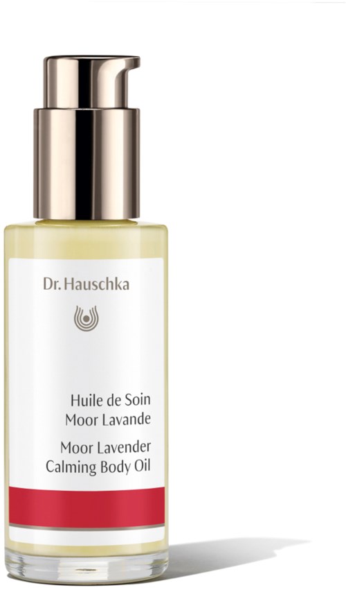 En flaske med Dr. Hauschka Moor Lavendel beroligende kroppsolje med sølvpumpe og hvit etikett.