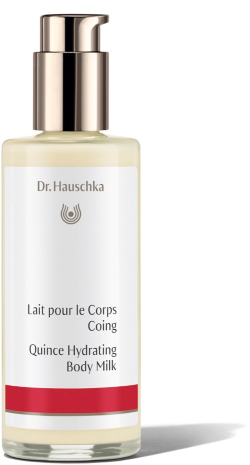 Pitkä läpinäkyvä pullo, jossa pumppu, merkki 'Dr. Hauschka Quince Hydrating Body Milk', valkoinen etiketti ja punainen raita.
