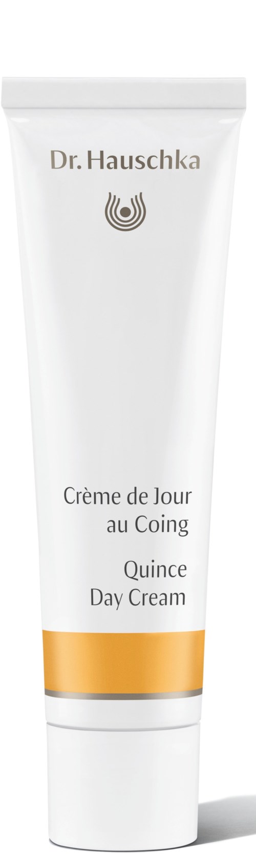 Biała tubka z złotą taśmą, oznaczona Dr. Hauschka, Quince Day Cream, do pielęgnacji skóry.