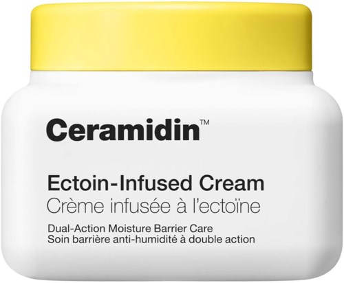 En hvit krukke med gul lokk, merket Ceramidin Ectoin-Infused Cream for hudpleie.