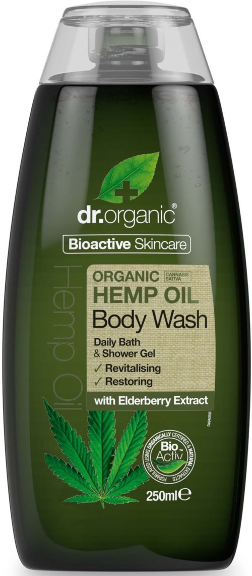 Een groene fles met biologische hennepolie lichaamswas, met bladontwerp, belooft verfrissend met elderbessenextract.