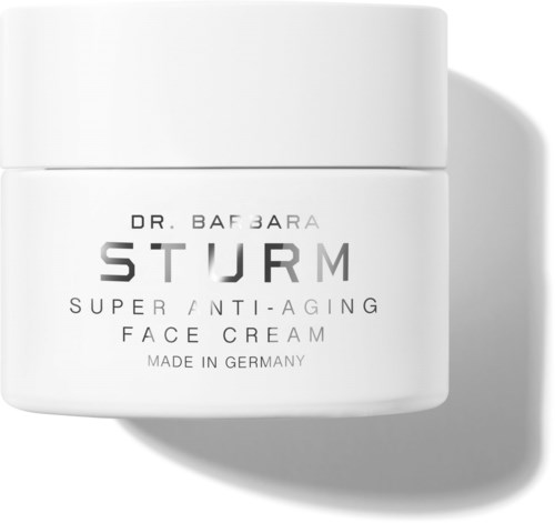 Weiße Dose mit Gesichtscreme, grauer Text, namens Super Anti-Aging, hergestellt in Deutschland.