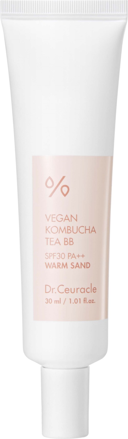 White tube with light pink label, text about vegan kombucha tea, SPF 30, warm sand, and Dr. Ceuracle.