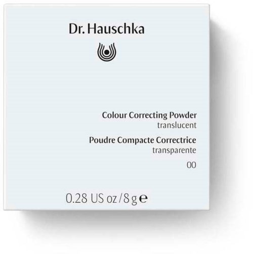 Witte doos met Dr. Hauschka-label, bevat kleurcorrigerend doorzichtig poeder. Gewicht 0,28 oz of 8 g.