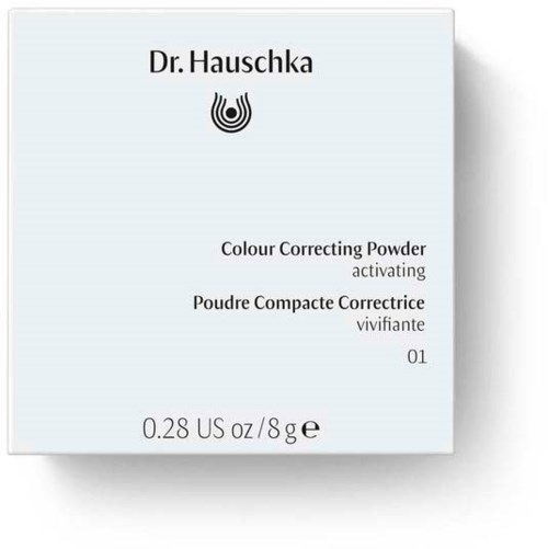 A box of Dr. Hauschka colour correcting powder with brand name, logo, product description, and weight info.