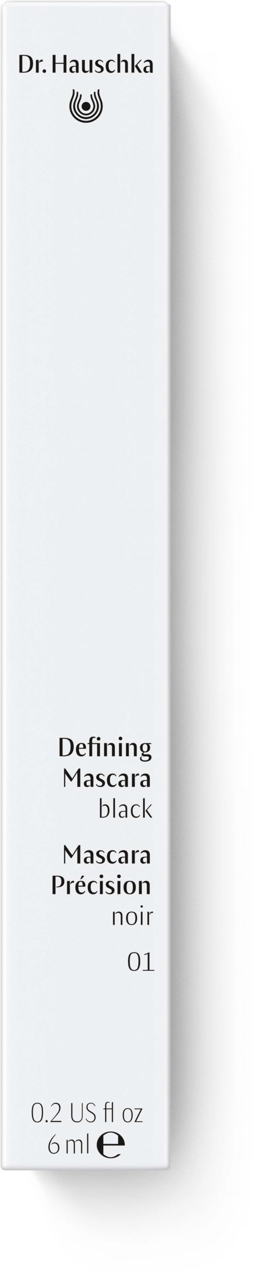 Eine weiße Mascara-Box mit schwarzem Text für Dr. Hauschka Mascara, 6 ml, gekennzeichnet 'Defining Mascara black.'