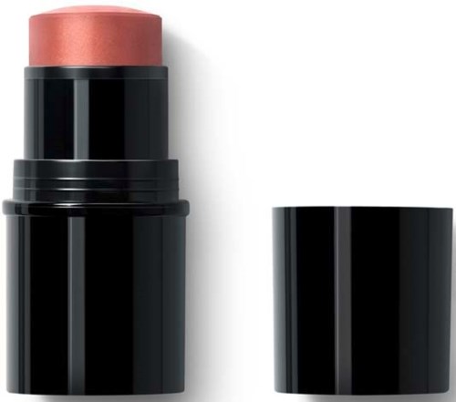 Een make-up stift in een zwart doosje met een perzikkleurig product zichtbaar bovenop.