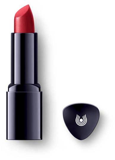 A red lipstick in a black case, with a small black cap nearby against a white background.