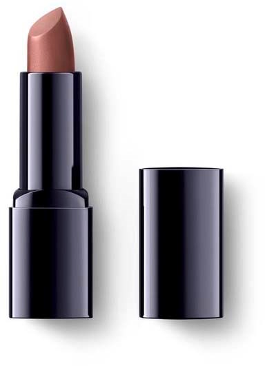 A lipstick with beige color in a black case, cap is removed and placed beside it.