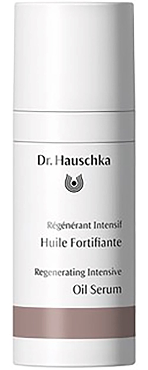 A white bottle of Dr. Hauschka regenerating intensive oil serum. Simple design with black text and a small icon.