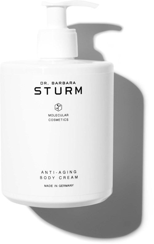 Weiße Flasche mit Pumpspender, gekennzeichnet 'Dr. Barbara Sturm Anti-Aging Body Cream, Made in Germany.'