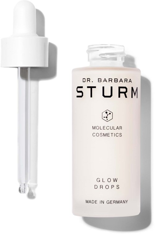 Eine weiße Flasche mit der Aufschrift 'Glow Drops' von Dr. Barbara Sturm und einem Tropfer. Sauberes, minimalistisches Design.