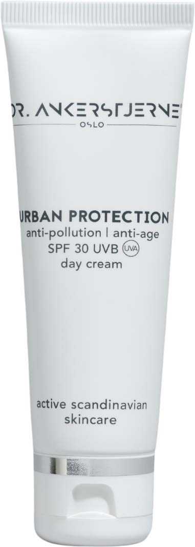 Een witte tube dagcrème met zwarte tekst, gelabeld als Dr. Akerserve Oslo Urban Protection, SPF 30, anti-vervuiling.