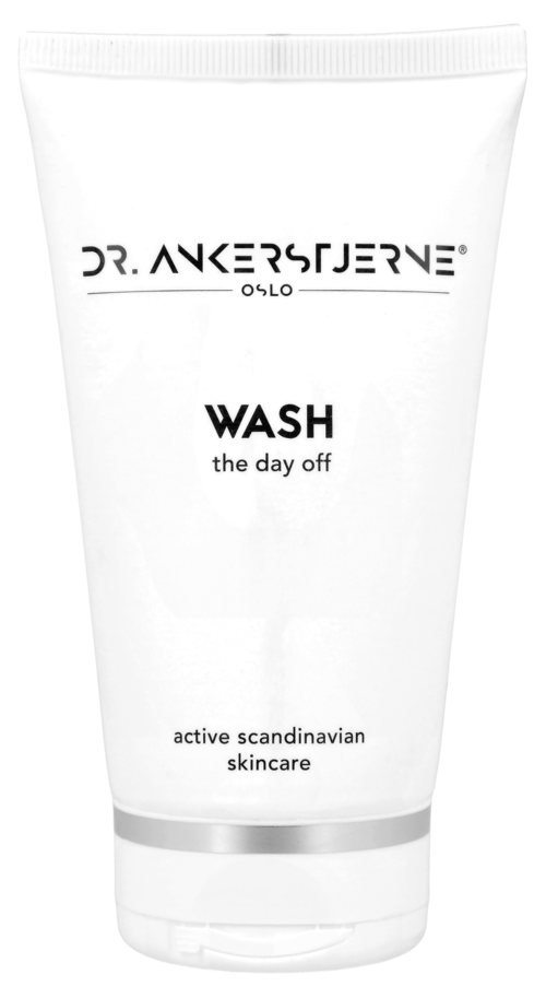 Een witte tube met het label "Dr. Ankerström" met de woorden "WASH the day off" en "actieve Scandinavische huidverzorging".