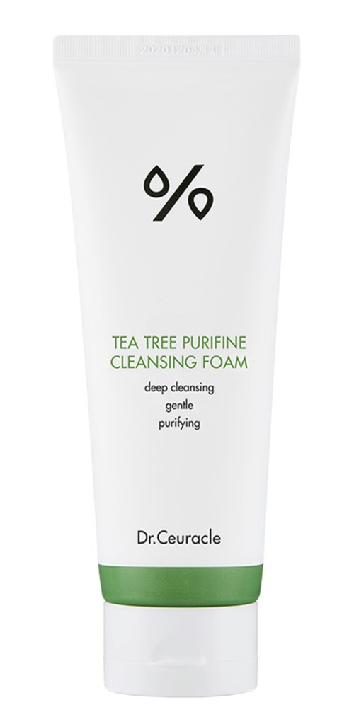 Een witte tube reinigingsschuim met groen en zwart tekst en een procentlogo op het label.