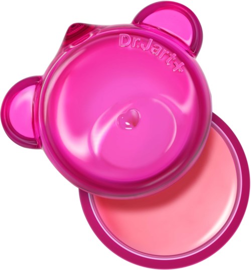 Pink bear-shaped container with a lid, revealing a light pink cream inside.