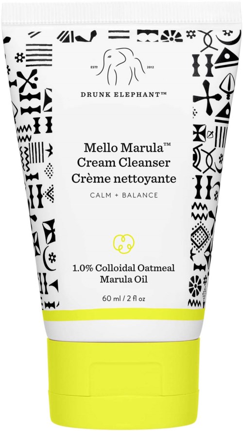 Putkki, jossa Drunk Elephant Mellow Marula Cream Cleanser, mustia kuvioita ja keltainen korkki.